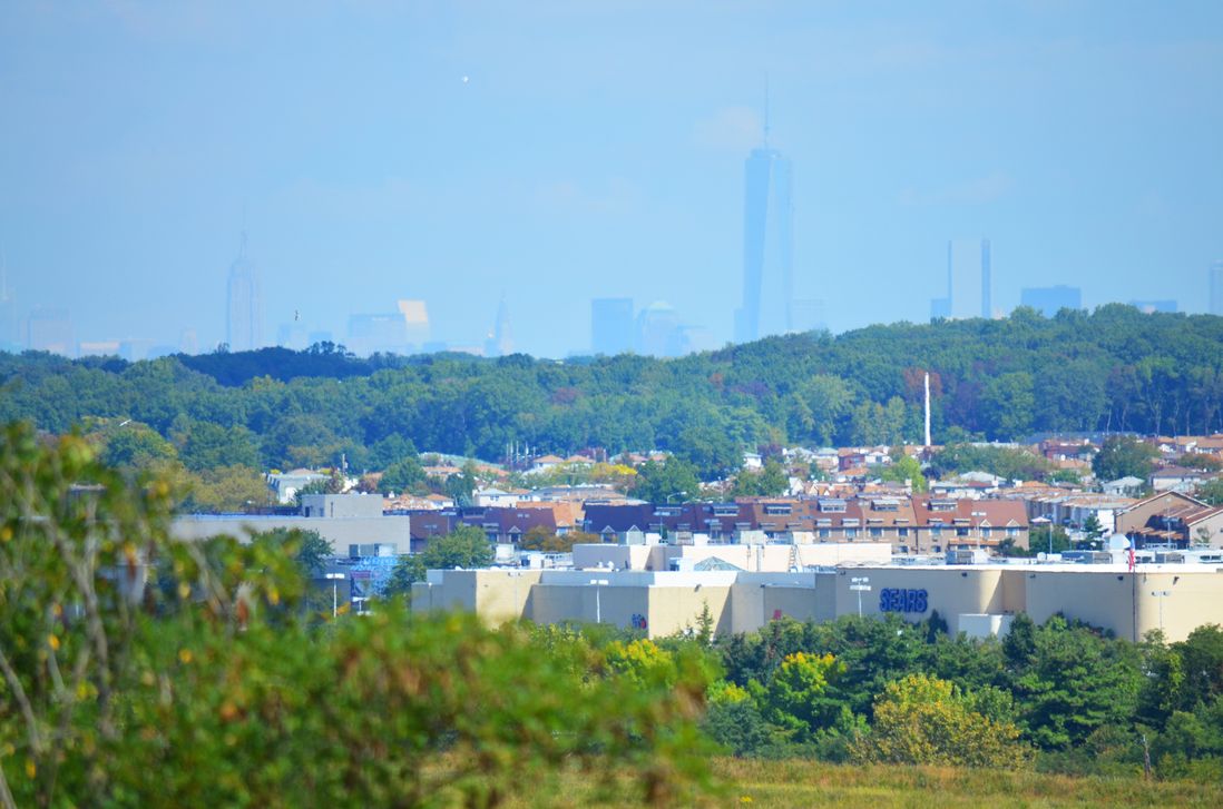 Empire State Building and One World Trade Center as seen from the South Park area of Freshkills Park. That’s the Staten Island Mall in the foreground.<br/>